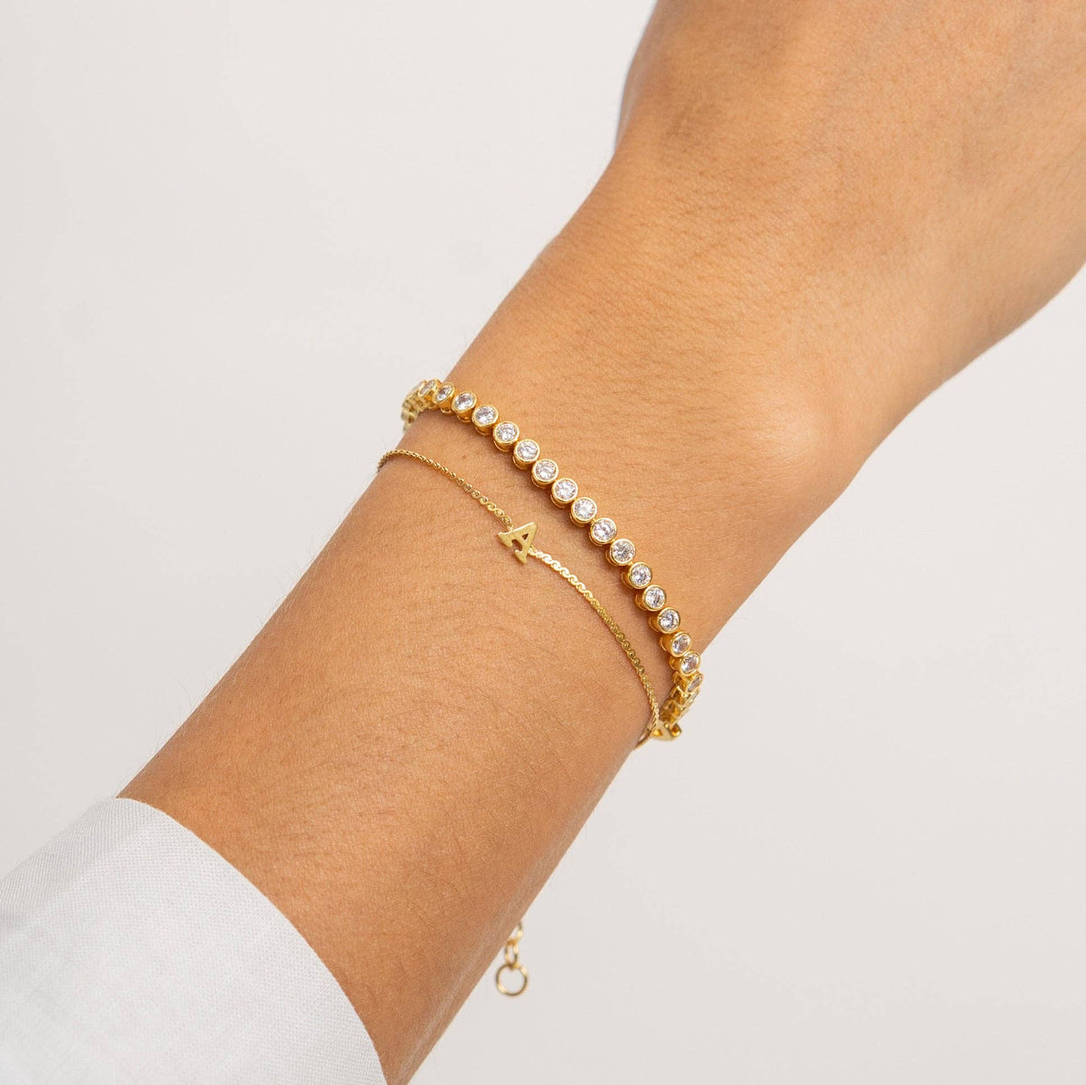 Brenda Grands 18K Gold Round Brilliant Tennis Bracelet in Silver